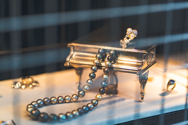 Natural pearl necklace displayed in an elegant jewelry showcase